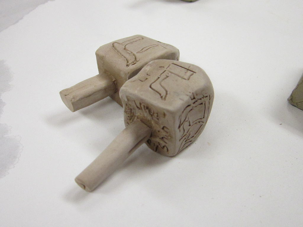 Ben Orlin / Loaded Dreidels